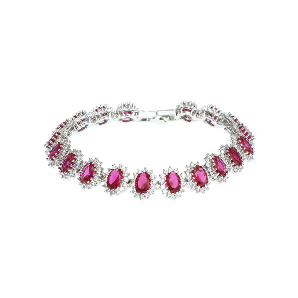 Bracelet with pink gemstones and silver clasp on a white background